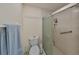 Updated bathroom with a walk-in shower and grab bar at 1006 Mcdaniel St # 21, Sun City Center, FL 33573