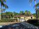 Relaxing community pool with adjacent patio and restrooms at 1006 Mcdaniel St # 21, Sun City Center, FL 33573