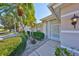 Welcoming front entry with landscaped walkway and porch at 1006 Mcdaniel St # 21, Sun City Center, FL 33573