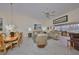 Bright and airy living room with dining area and tile floor at 1006 Mcdaniel St # 21, Sun City Center, FL 33573