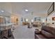 Spacious living room with vaulted ceilings, and comfortable seating at 1006 Mcdaniel St # 21, Sun City Center, FL 33573