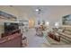Bright living room featuring a neutral color palette and open floor plan at 1006 Mcdaniel St # 21, Sun City Center, FL 33573