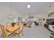 Bright and airy living room with dining area and tile floor at 1006 Mcdaniel St # 21, Sun City Center, FL 33573