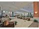 Community clubhouse lobby with seating areas at 1006 Mcdaniel St # 21, Sun City Center, FL 33573