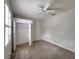 Bedroom with a large closet and ceiling fan at 10232 Grant Creek Dr, Tampa, FL 33647