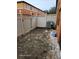 Private backyard with small patio and fence at 1028 Tullamore Dr, Wesley Chapel, FL 33543