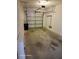 Spacious garage with automatic garage door opener at 1028 Tullamore Dr, Wesley Chapel, FL 33543