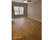 Light and bright living room with vinyl plank flooring at 1028 Tullamore Dr, Wesley Chapel, FL 33543