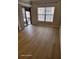 Living area with sliding doors leading to patio at 1028 Tullamore Dr, Wesley Chapel, FL 33543