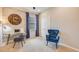 Home office space with a brick feature wall and comfortable seating at 10822 Patoka Ter, Parrish, FL 34219