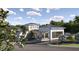 Community entrance with covered portico and landscaping at 12661 Lily Quartz Loop, Parrish, FL 34219
