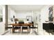 Dining area with six chairs and a wood dining table, near kitchen at 12661 Lily Quartz Loop, Parrish, FL 34219