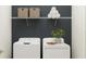 Laundry room with washer, dryer, and shelving at 12661 Lily Quartz Loop, Parrish, FL 34219