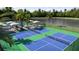 Enjoy resort-style pickleball courts with seating areas at 12661 Lily Quartz Loop, Parrish, FL 34219