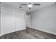 Bright bedroom with double door closet and ceiling fan at 1421 Normandy Park Dr # 2, Clearwater, FL 33756