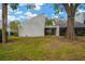 Landscaped backyard with spacious green area at 14221 Cypress Cir # 14221, Tampa, FL 33618