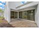 Private patio with sliding glass doors at 14221 Cypress Cir # 14221, Tampa, FL 33618