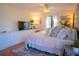Bright bedroom with king-size bed and lots of natural light at 1433 Pine Glen Pl # G2, Tarpon Springs, FL 34688