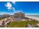 Aerial view of building near beach; prime location at 1460 Gulf Blvd # 811, Clearwater Beach, FL 33767