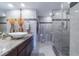 Modern bathroom with granite vanity, vessel sink and large walk in shower at 1460 Gulf Blvd # 811, Clearwater Beach, FL 33767