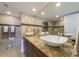 Updated bathroom with granite countertop, double sinks, and walk-in shower at 1460 Gulf Blvd # 811, Clearwater Beach, FL 33767