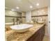 Elegant bathroom with granite countertops, vessel sinks, and a large glass shower at 1460 Gulf Blvd # 811, Clearwater Beach, FL 33767
