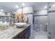 Modern bathroom with granite vanity, vessel sink and large walk in shower at 1460 Gulf Blvd # 811, Clearwater Beach, FL 33767