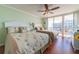 Bedroom with two beds and balcony access with city view at 1460 Gulf Blvd # 811, Clearwater Beach, FL 33767