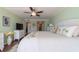 King bed, white dresser, and calming decor in bedroom at 1460 Gulf Blvd # 811, Clearwater Beach, FL 33767