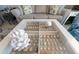 Unique coffee table with glass top showcasing seashells and coral at 1460 Gulf Blvd # 811, Clearwater Beach, FL 33767