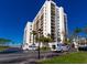 Front view of a high rise building with parking at 1460 Gulf Blvd # 811, Clearwater Beach, FL 33767