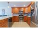 Eat-in kitchen with stainless steel appliances and ample counter space at 1460 Gulf Blvd # 811, Clearwater Beach, FL 33767
