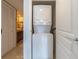 Stackable washer and dryer in a dedicated laundry closet at 1460 Gulf Blvd # 811, Clearwater Beach, FL 33767