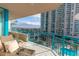 Relax on the balcony with comfortable seating and enjoy breathtaking ocean views at 1520 Gulf Blvd # 603, Clearwater Beach, FL 33767