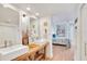 Bright bathroom with double vanity and walk-in shower at 1520 Gulf Blvd # 603, Clearwater Beach, FL 33767
