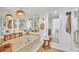 Relaxing bathroom with soaking tub and decorative lighting at 1520 Gulf Blvd # 603, Clearwater Beach, FL 33767