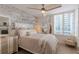 Bright bedroom with a beachy feel and comfortable bedding at 1520 Gulf Blvd # 603, Clearwater Beach, FL 33767
