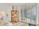 Bedroom with coastal decor and access to a private balcony at 1520 Gulf Blvd # 603, Clearwater Beach, FL 33767