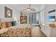 Serene bedroom featuring coastal decor and stunning ocean views at 1520 Gulf Blvd # 603, Clearwater Beach, FL 33767