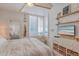 Bedroom with ocean view, TV, and coastal decor at 1520 Gulf Blvd # 603, Clearwater Beach, FL 33767