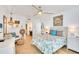 Coastal-themed bedroom with ceiling fan and ocean view at 1520 Gulf Blvd # 603, Clearwater Beach, FL 33767