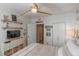 Coastal-themed bedroom with TV and built-in shelving at 1520 Gulf Blvd # 603, Clearwater Beach, FL 33767