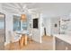 Bright dining area with wood table and chairs at 1520 Gulf Blvd # 603, Clearwater Beach, FL 33767