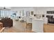 Open concept kitchen with breakfast bar and island at 1520 Gulf Blvd # 603, Clearwater Beach, FL 33767