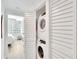 Convenient laundry closet with stackable washer and dryer at 1520 Gulf Blvd # 603, Clearwater Beach, FL 33767