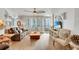 Relaxing living room featuring hardwood floors and comfortable seating at 1520 Gulf Blvd # 603, Clearwater Beach, FL 33767