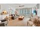 Bright living room with large windows and hardwood floors at 1520 Gulf Blvd # 603, Clearwater Beach, FL 33767