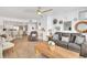 Relaxing living room with comfy seating and wood coffee table at 1520 Gulf Blvd # 603, Clearwater Beach, FL 33767