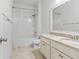 Clean bathroom featuring a tub shower combo and granite vanity at 15571 Stone House Dr, Brooksville, FL 34604