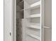 Custom built-in shelving and drawers in this closet at 15571 Stone House Dr, Brooksville, FL 34604
